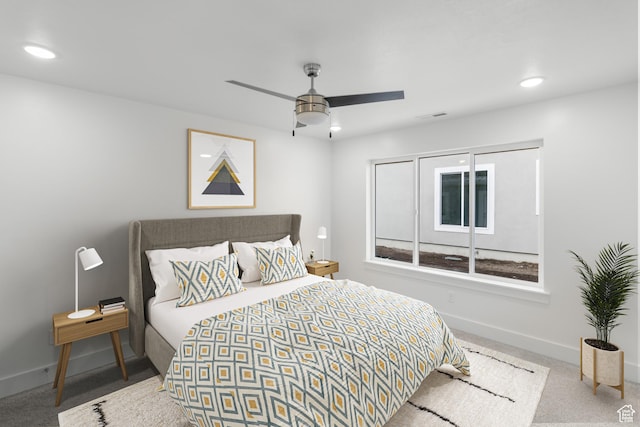bedroom with baseboards, recessed lighting, carpet flooring, and ceiling fan