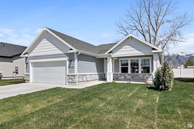 view of front of house featuring an attached garage, concrete driveway, stone siding, a porch, and roof with shingles