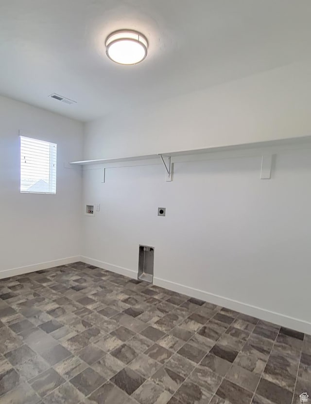 laundry area with hookup for a washing machine, baseboards, and electric dryer hookup