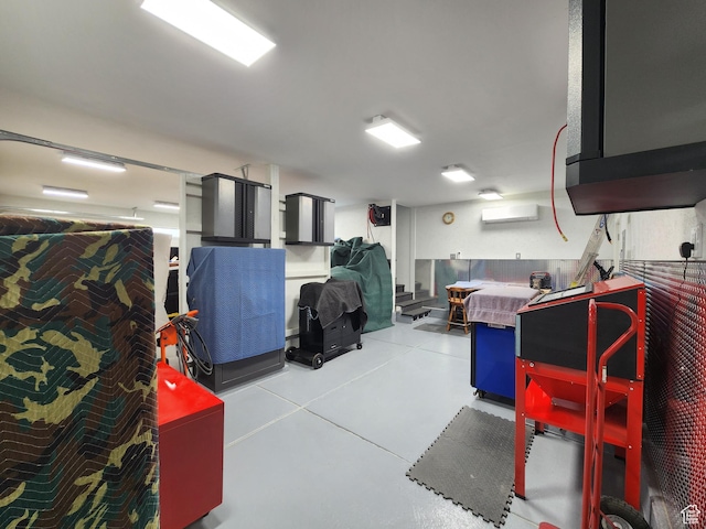 garage featuring an AC wall unit