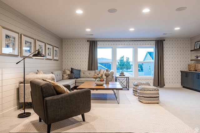 living area with carpet floors and recessed lighting