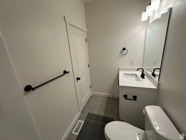 568 S 900 W, American Fork, UT 84003 - half bathroom with toilet, tile patterned floors, vanity, and baseboards