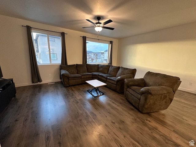 568 S 900 W, American Fork, UT 84003 - living area featuring dark wood finished floors, a ceiling fan, and baseboards