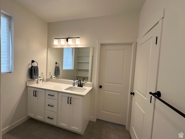 568 S 900 W, American Fork, UT 84003 - bathroom with tile patterned flooring, double vanity, and plenty of natural light