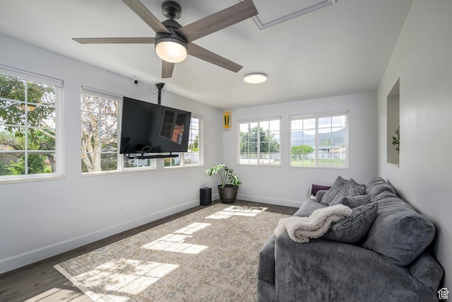 547 N 650 E, Orem, UT 84097 - living area featuring a ceiling fan, baseboards, and wood finished floors