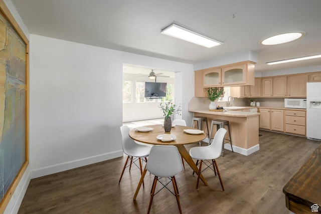 547 N 650 E, Orem, UT 84097 - dining area with dark wood-style floors, baseboards, and ceiling fan
