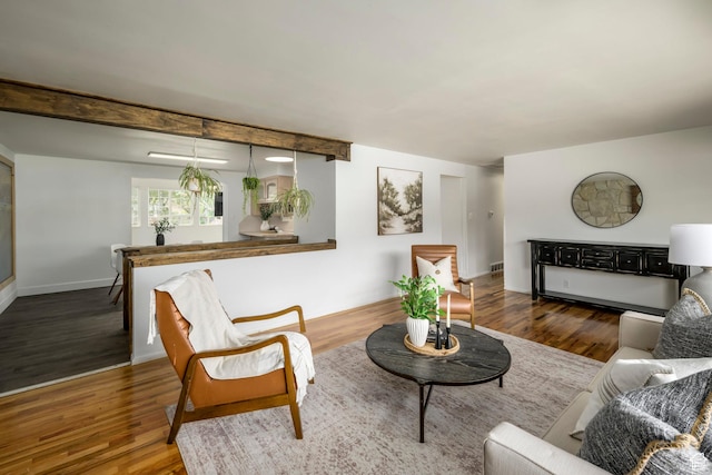 547 N 650 E, Orem, UT 84097 - living room featuring wood finished floors, beam ceiling, and baseboards