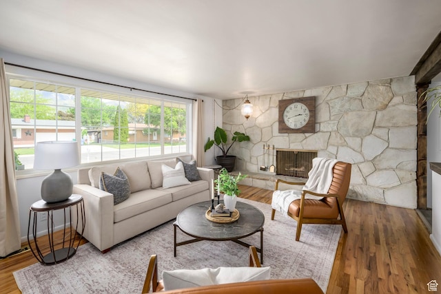 547 N 650 E, Orem, UT 84097 - living area with a fireplace and wood finished floors
