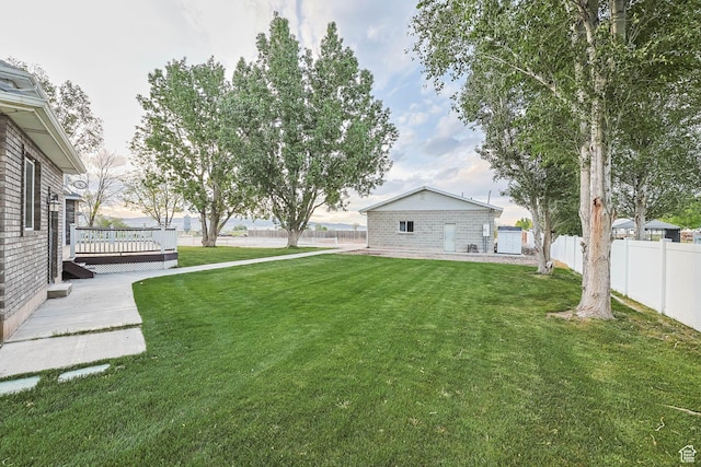 view of yard featuring a wooden deck