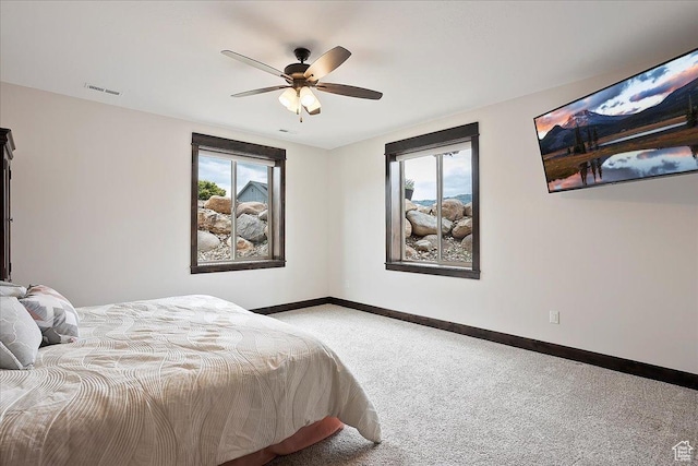 3749 N Eagle Ridge Dr E, Eden, UT 84310 - carpeted bedroom with baseboards and ceiling fan