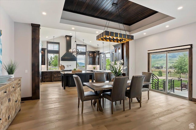 3749 N Eagle Ridge Dr E, Eden, UT 84310 - dining room with a raised ceiling, recessed lighting, light wood finished floors, and healthy amount of natural light