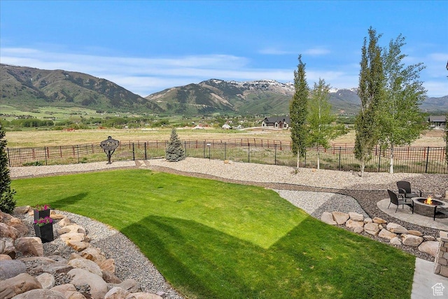 3749 N Eagle Ridge Dr E, Eden, UT 84310 - view of yard featuring an outdoor fire pit and a mountain view