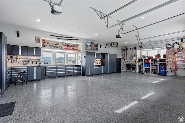 3749 N Eagle Ridge Dr E, Eden, UT 84310 - garage with recessed lighting and a garage door opener
