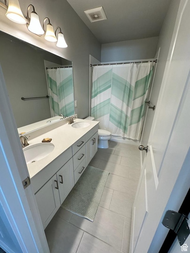 3146 W 1280 N, Provo, UT 84601 - full bath with toilet, double vanity, tile patterned flooring, and curtained shower