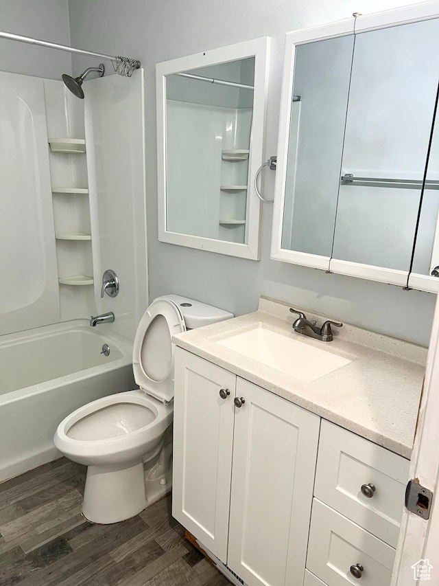 3272 W 3540 S Unit A-B, West Valley City, UT 84119 - full bathroom with wood finished floors, shower / washtub combination, toilet, and vanity