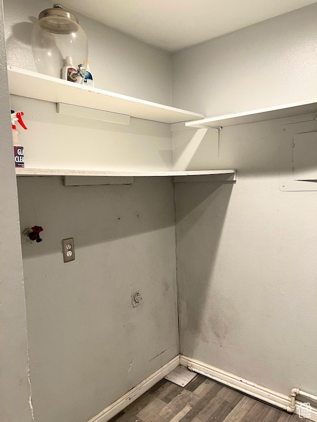 3272 W 3540 S Unit A-B, West Valley City, UT 84119 - clothes washing area with wood finished floors and baseboards