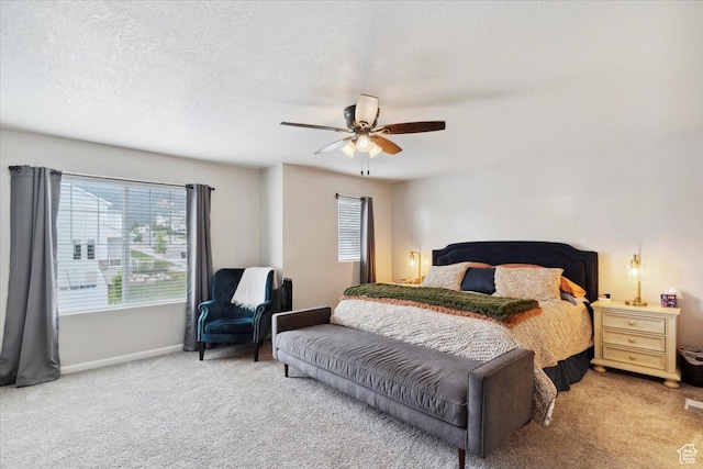3191 N 1500 E, Layton, UT 84040 - carpeted bedroom with multiple windows, baseboards, and ceiling fan
