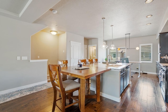 26 N 1100 W, Farmington, UT 84025 - kitchen with a sink, dark wood finished floors, baseboards, recessed lighting, and a textured ceiling
