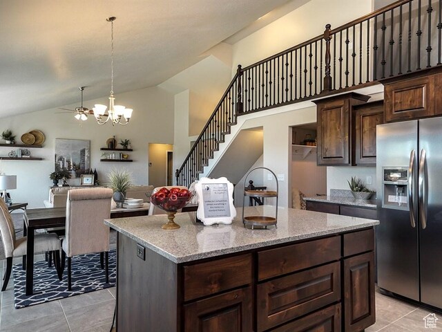 3286 S 2275 W, West Haven, UT 84401 - kitchen featuring stainless steel refrigerator with ice dispenser, light tile patterned flooring, ceiling fan, dark brown cabinets, and a center island