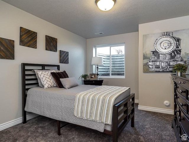 3286 S 2275 W, West Haven, UT 84401 - bedroom featuring dark colored carpet, baseboards, and a textured ceiling