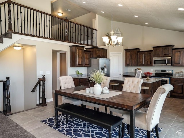 3286 S 2275 W, West Haven, UT 84401 - dining room featuring a chandelier, high vaulted ceiling, light tile patterned flooring, recessed lighting, and baseboards