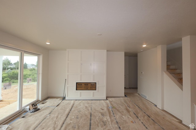 1146 E Hollyhock Way, Layton, UT 84040 - unfurnished living room with recessed lighting and stairs