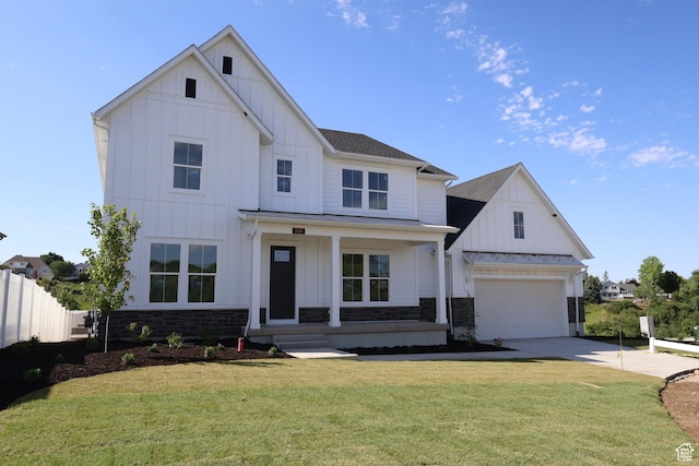 1146 E Hollyhock Way, Layton, UT 84040 - modern farmhouse style home with board and batten siding, covered porch, concrete driveway, and a garage