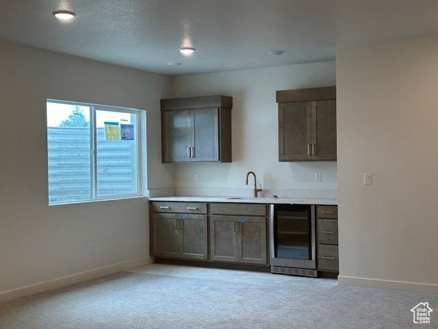 1146 E Hollyhock Way, Layton, UT 84040 - bar featuring wine cooler and light carpet