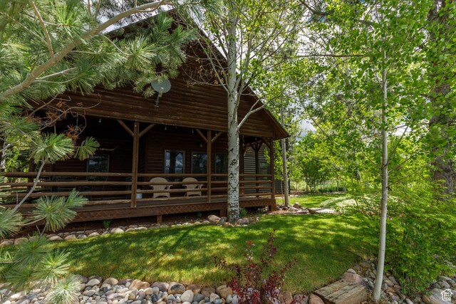 448 S 8600 E, Huntsville, UT 84317 - back of property with a deck, a yard, and log veneer siding