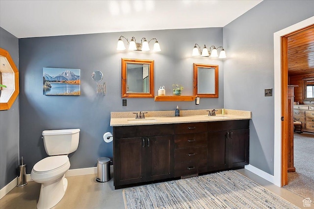 448 S 8600 E, Huntsville, UT 84317 - bathroom with baseboards, toilet, and double vanity
