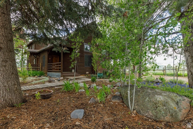 448 S 8600 E, Huntsville, UT 84317 - view of front of home featuring covered porch and log veneer siding