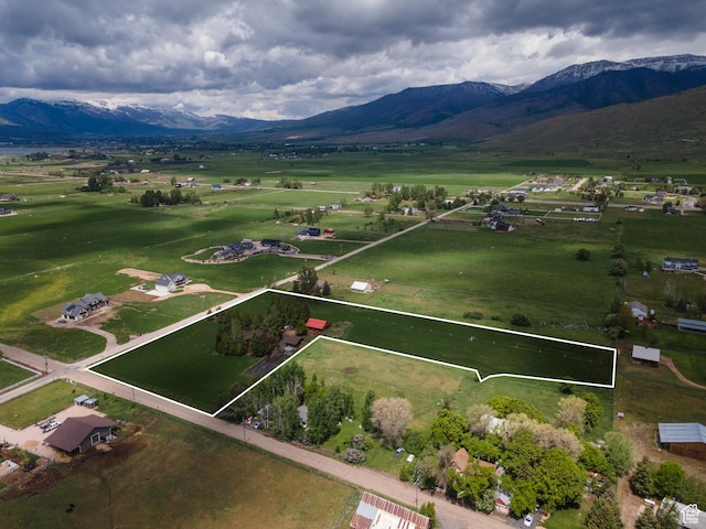 448 S 8600 E, Huntsville, UT 84317 - aerial view of property and surrounding area with property parcel outlined, mountains, and rural landscape