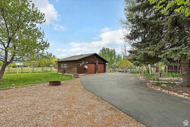 448 S 8600 E, Huntsville, UT 84317 - view of home's exterior featuring a garage and an outbuilding