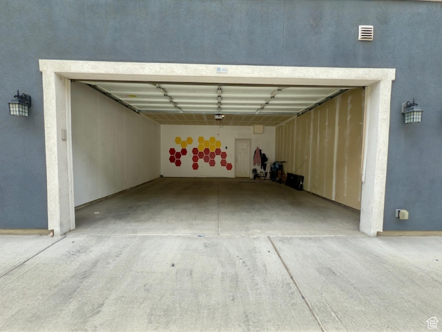 garage featuring a garage door opener