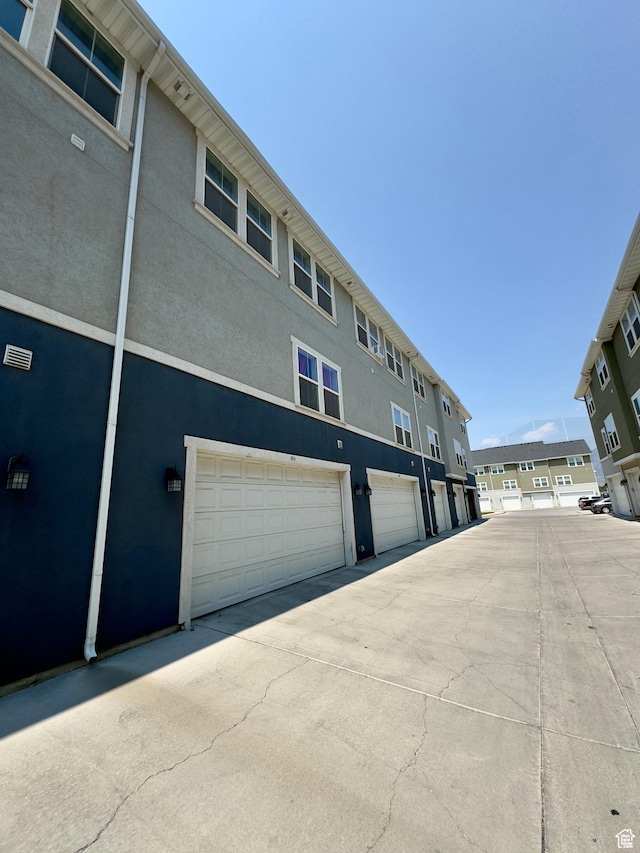 view of building exterior with a garage