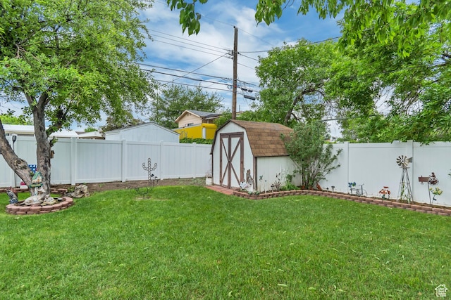 3238 S Maple Way, West Valley City, UT 84119 - view of yard with a storage unit and an outbuilding