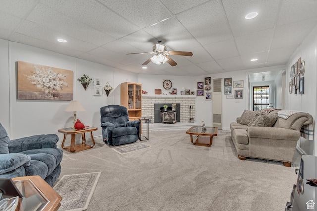 3238 S Maple Way, West Valley City, UT 84119 - carpeted living area featuring a ceiling fan, recessed lighting, and a drop ceiling