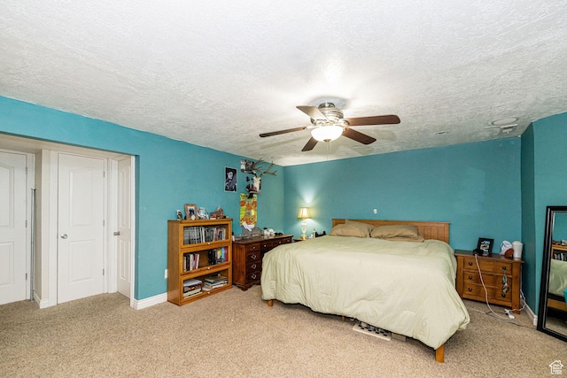 101 E 630 N # 7, Smithfield, UT 84335 - carpeted bedroom featuring a textured ceiling, a ceiling fan, and baseboards