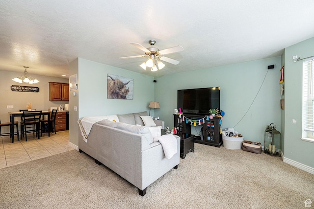 101 E 630 N # 7, Smithfield, UT 84335 - living area with light colored carpet, a chandelier, ceiling fan, and healthy amount of natural light