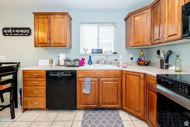 101 E 630 N # 7, Smithfield, UT 84335 - kitchen featuring black appliances, a sink, brown cabinetry, and light countertops