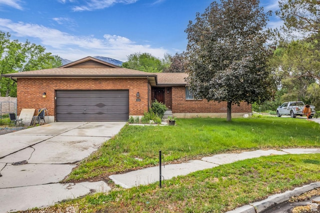 926 N 400 E, American Fork, UT 84003 - ranch-style house featuring brick siding, a front lawn, a garage, concrete driveway, and roof with shingles