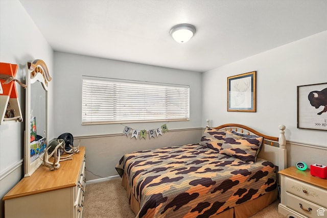 bedroom featuring carpet
