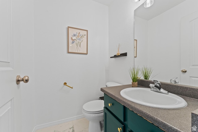 2868 W Willow Sprout Rd S, Lehi, UT 84043 - bathroom featuring marble look tiles, vanity, toilet, and baseboards