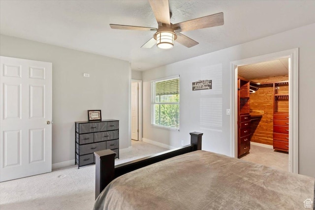 2115 N 600 W, West Bountiful, UT 84087 - bedroom featuring carpet flooring, a spacious closet, baseboards, and a ceiling fan