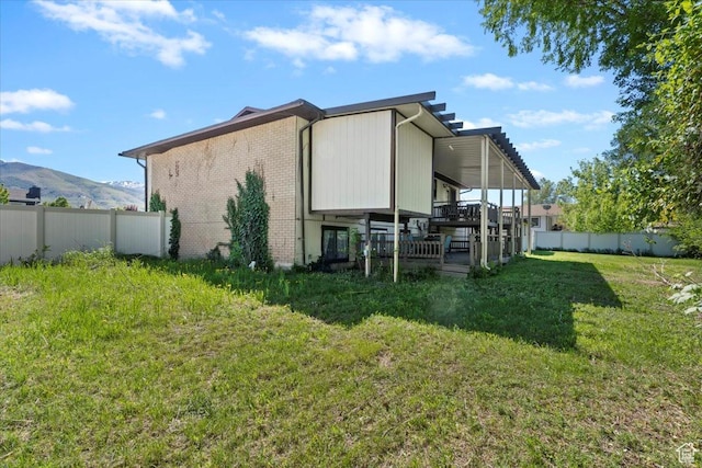 2115 N 600 W, West Bountiful, UT 84087 - back of property featuring a deck with mountain view and brick siding