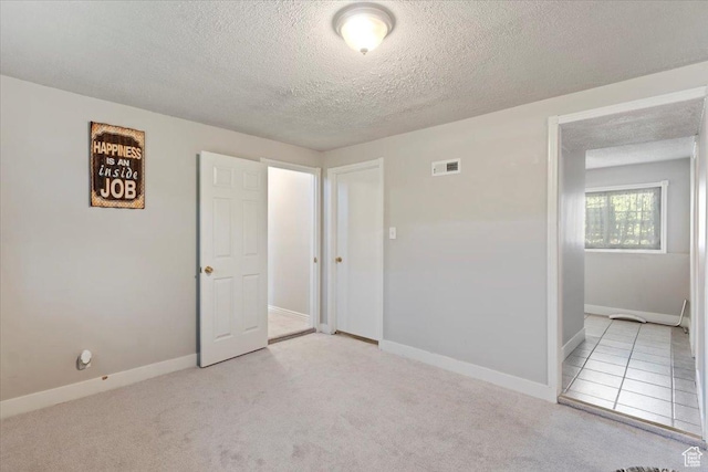 2115 N 600 W, West Bountiful, UT 84087 - spare room with a textured ceiling, baseboards, and carpet