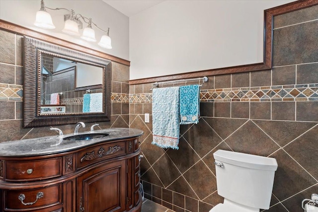 2115 N 600 W, West Bountiful, UT 84087 - bathroom featuring tile walls, toilet, and vanity