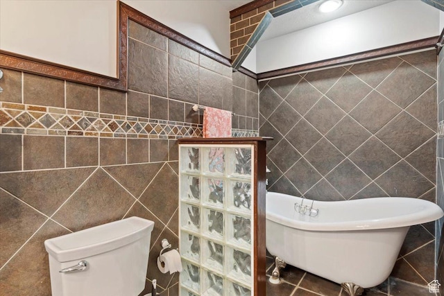 2115 N 600 W, West Bountiful, UT 84087 - full bath featuring tile walls, a freestanding tub, and toilet