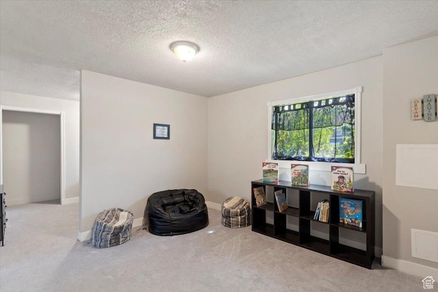 2115 N 600 W, West Bountiful, UT 84087 - sitting room with carpet floors, a textured ceiling, and baseboards