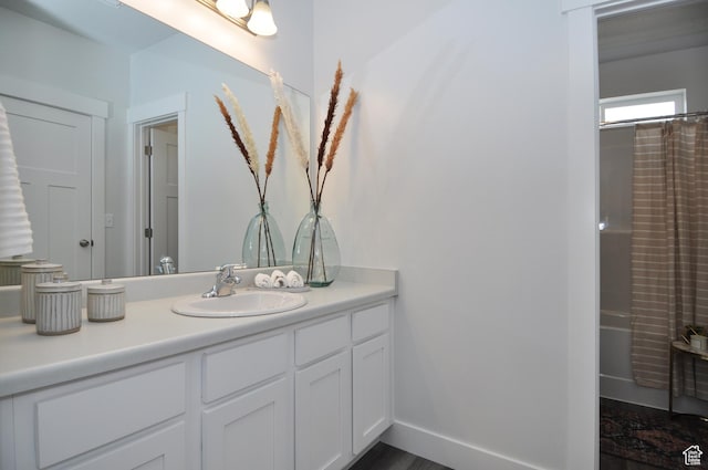 full bathroom featuring vanity